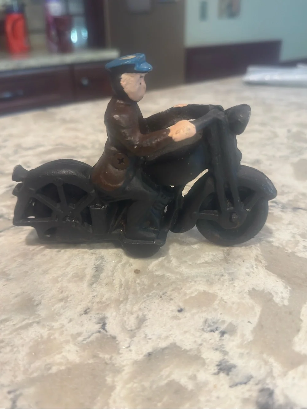 Vintage Cast Iron Motorcyclist Figurine - Black & Brown with Blue Cap 6 inches